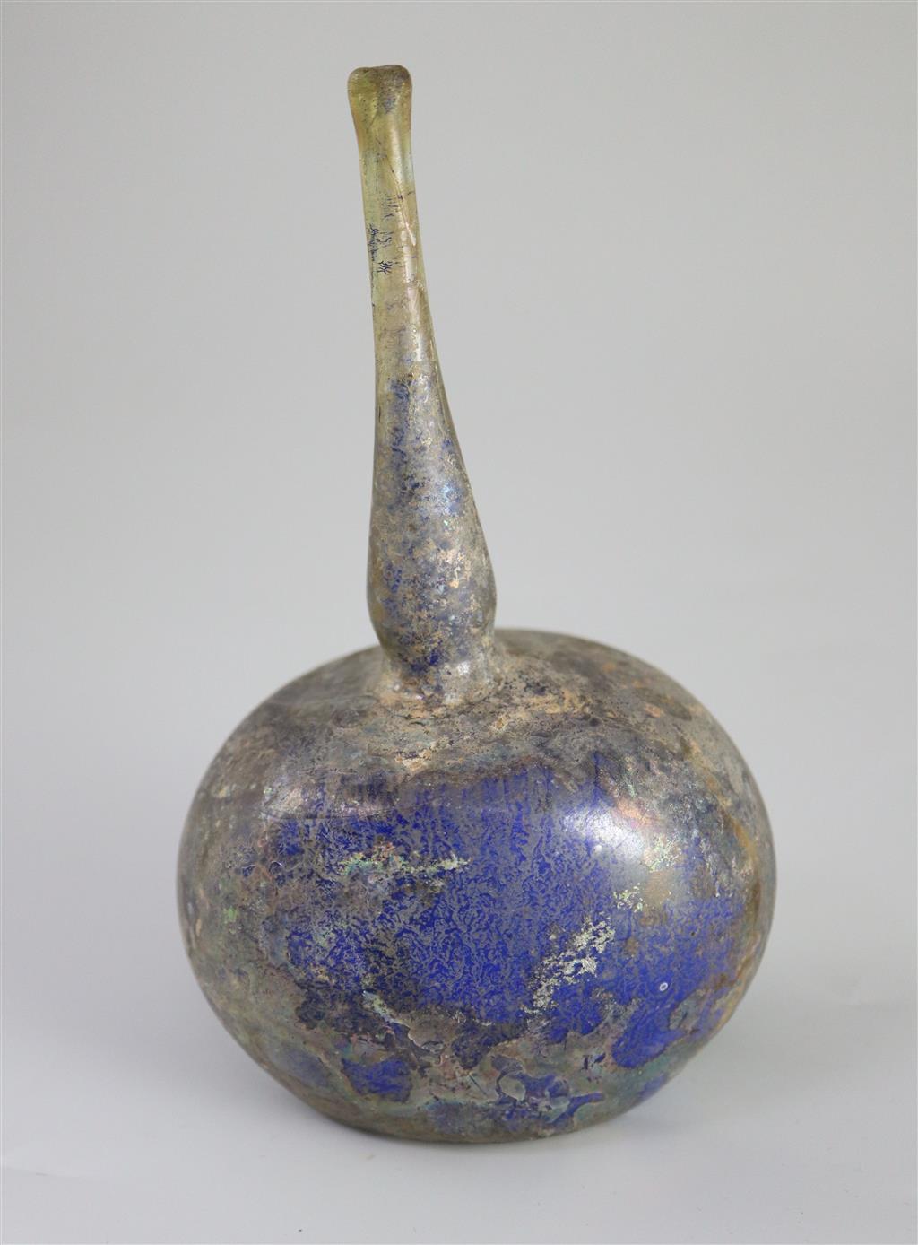 An Islamic blue glass perfume sprinkler, Egypt, c.1250-1350 AD, 17cm high,